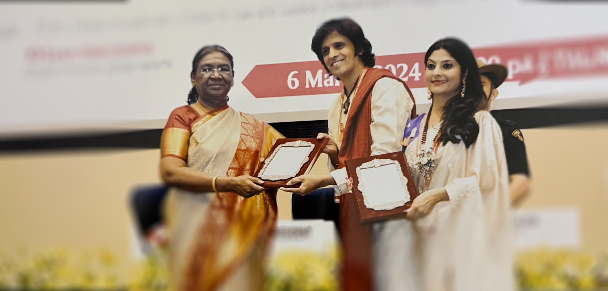 Nirupama and Rajendra receiving the Sangeet Natak Akademi Award from the President of India